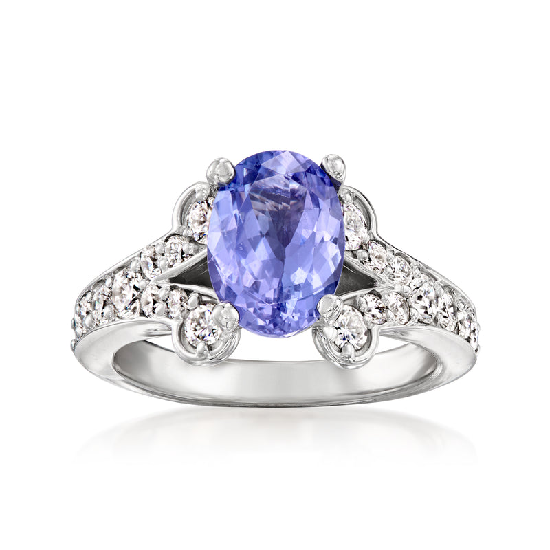 Oval blue tanzanite ring with diamond side accents, 18kt white gold setting