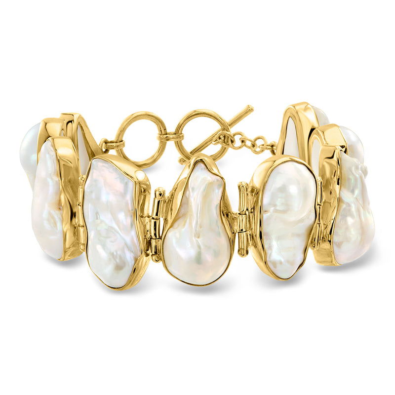 Baroque pearl bracelet with white iridescent pearls and gold over sterling links