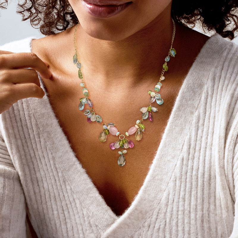 Gold over sterling multi-gem floral bead necklace worn on the neckline