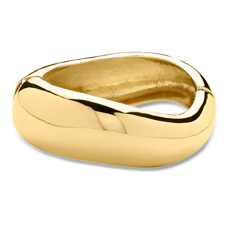 Curvy gold-tone bangle bracelet with smooth domed profile