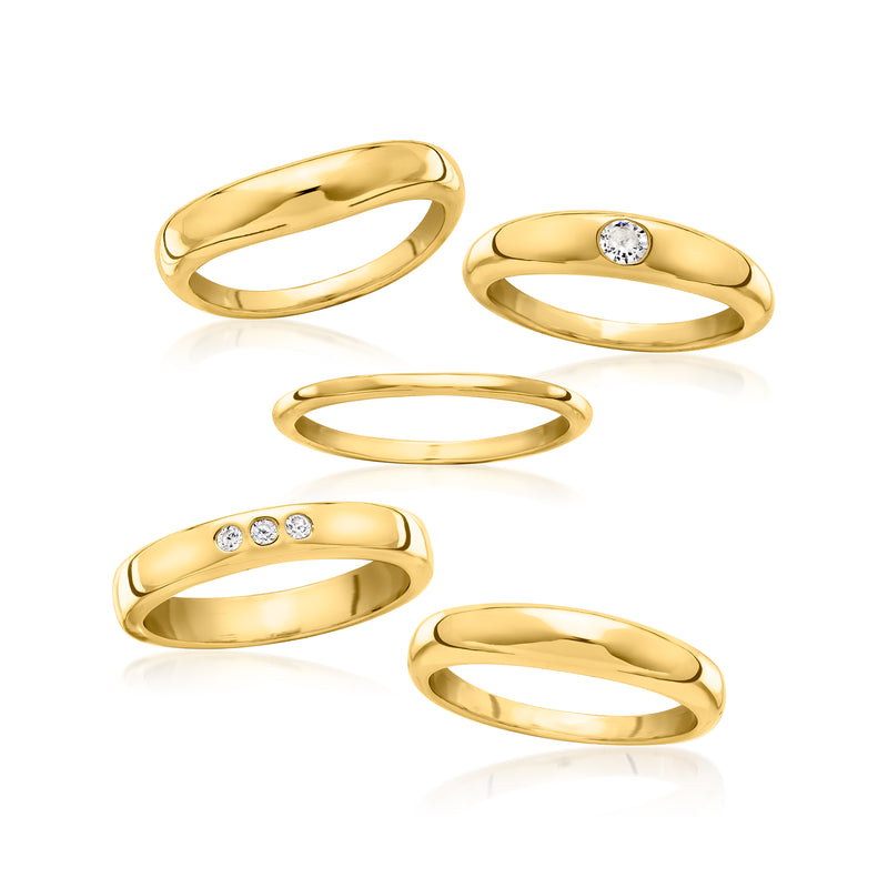 Gold-plated five-ring set with CZ accents, flat lay of rings