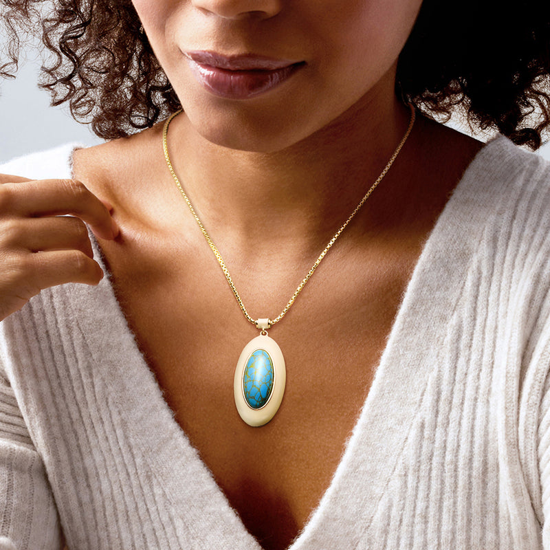 Gold-plated chain necklace with oval white enamel pendant and blue turquoise center