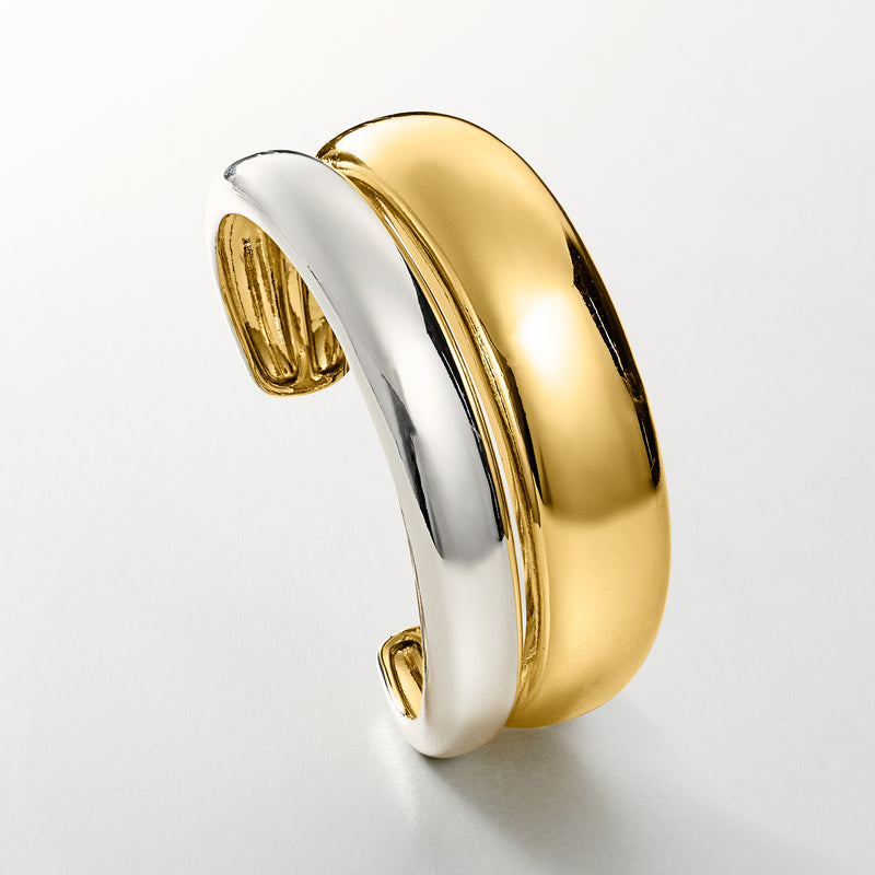 Two-tone hinged cuff bracelet with gold outer band and silver inner band