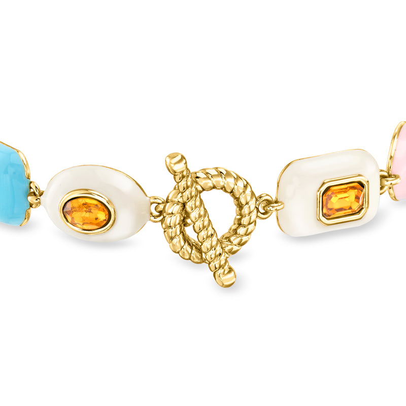 Yellow gold-plated bracelet close-up with oval, square, and round multicolored charms