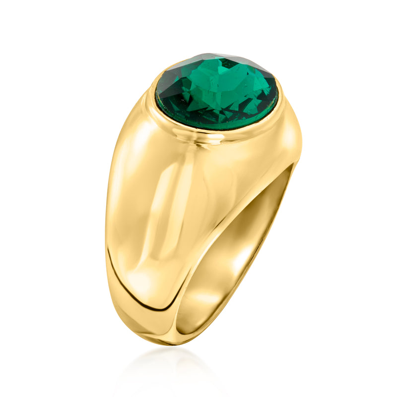 Yellow gold-plated ring with oval simulated emerald green stone and curved band