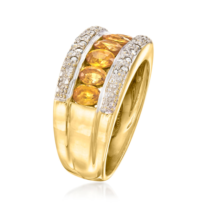 Yellow gold ring side view with oval yellow sapphires and sparkling diamond frame