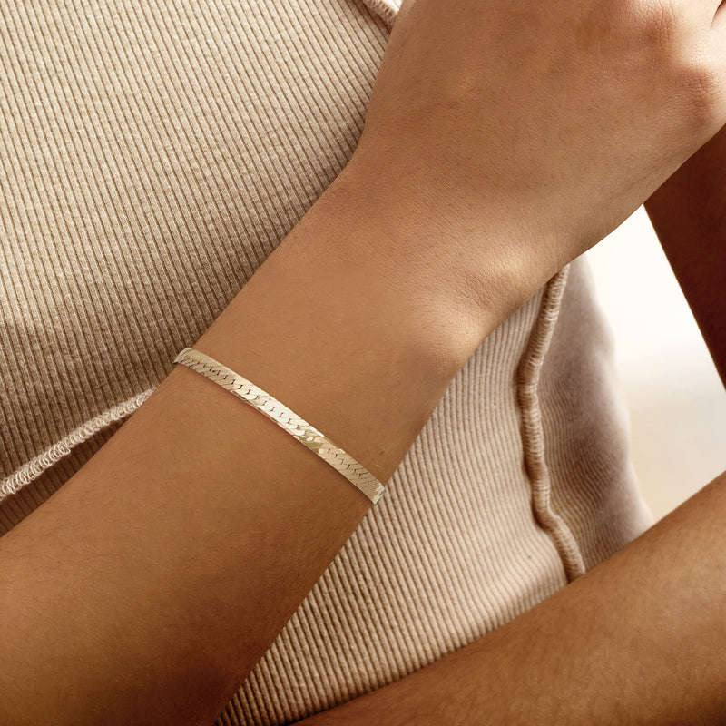 Vintage 14kt yellow gold fancy-chain bracelet on wrist, box clasp detail