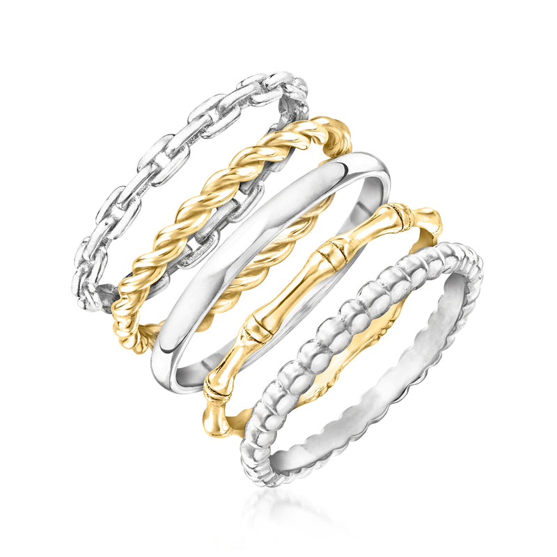 Stackable ring set with silver chain-link, gold rope twist, smooth bands, and beaded silver
