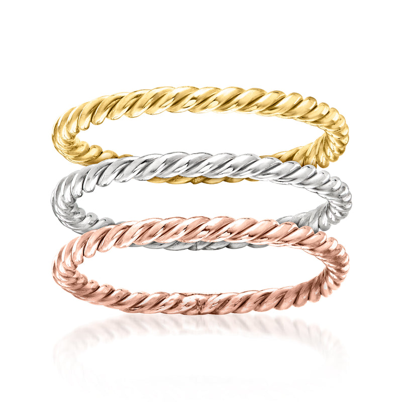Three roped two-tone rings set in gold, silver, and rose metal