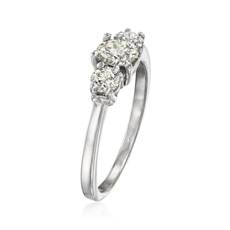 Side view three-stone diamond ring in 14kt white gold with prong-set stones