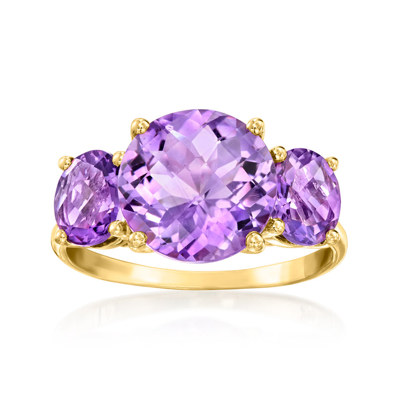 14kt yellow gold three-stone amethyst ring with oval center and two side stones