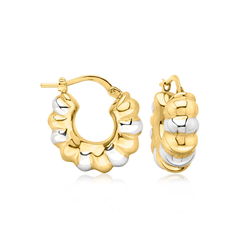 Gold-and-silver ribbed hoop earrings with textured finish and hinged clasp