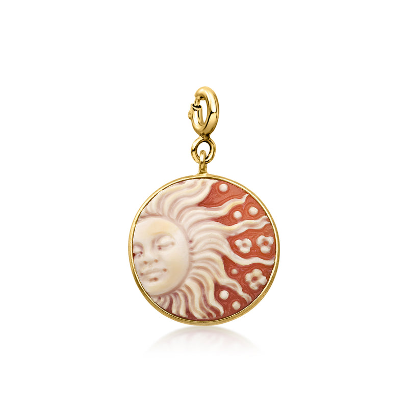 Gold-tone round sun cameo charm with orange shell design and woman face