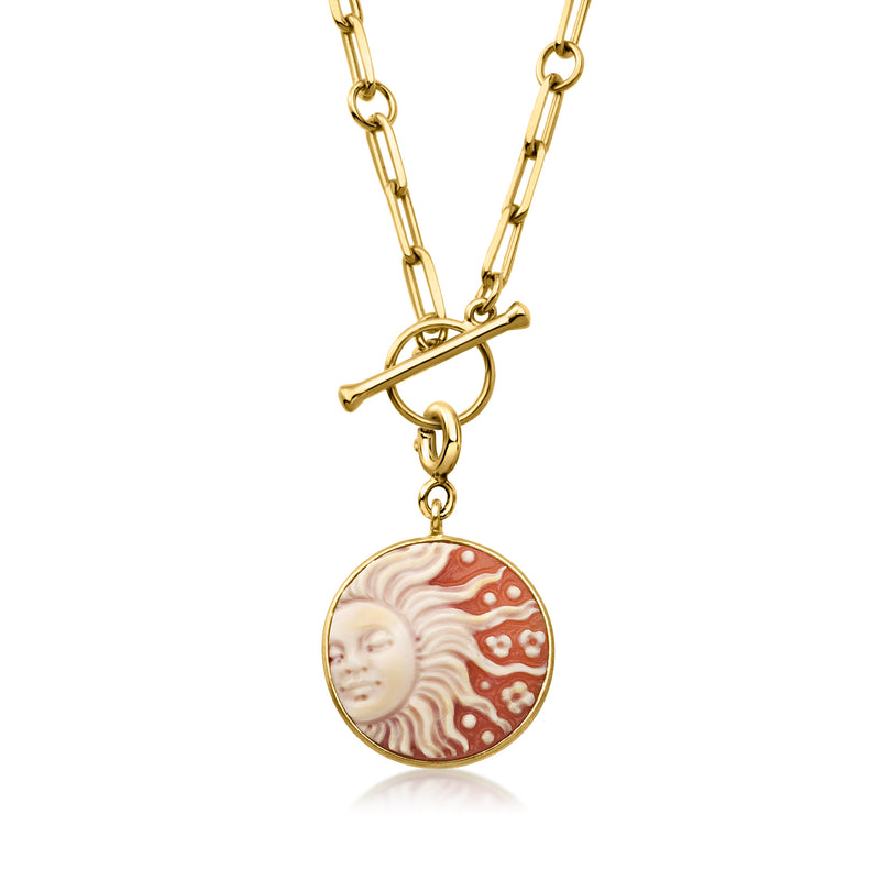 Round orange shell sun cameo charm pendant with gold-tone chain and bail