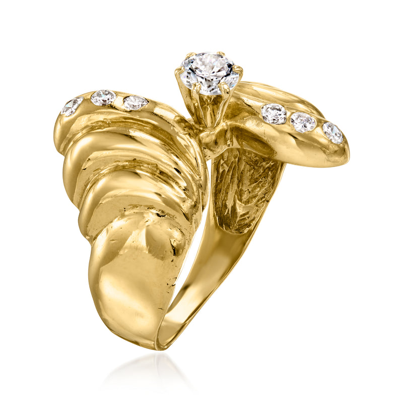 Gold bypass ring with large center round diamond and smaller diamonds on band