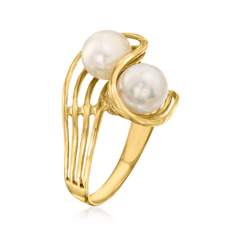 14kt yellow gold bypass ring with two large white cultured pearls, curved profile