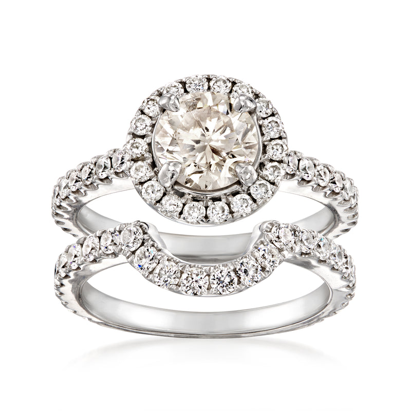Vintage diamond bridal ring set in 14kt white gold with halo and pavé bands