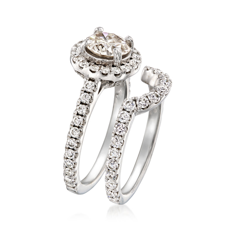 Diamond bridal set in 14kt white gold with halo engagement ring and matching band
