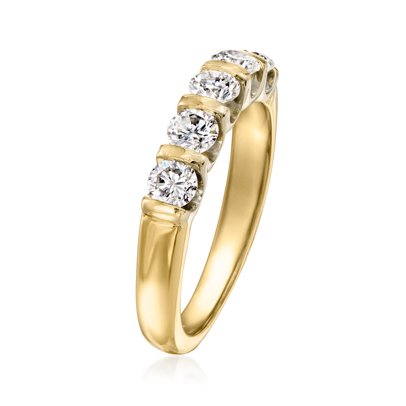 Five-stone diamond band in 14kt yellow gold with five round diamonds