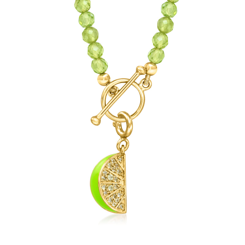 Lime wedge charm with green enamel, peridot accents, and gold setting