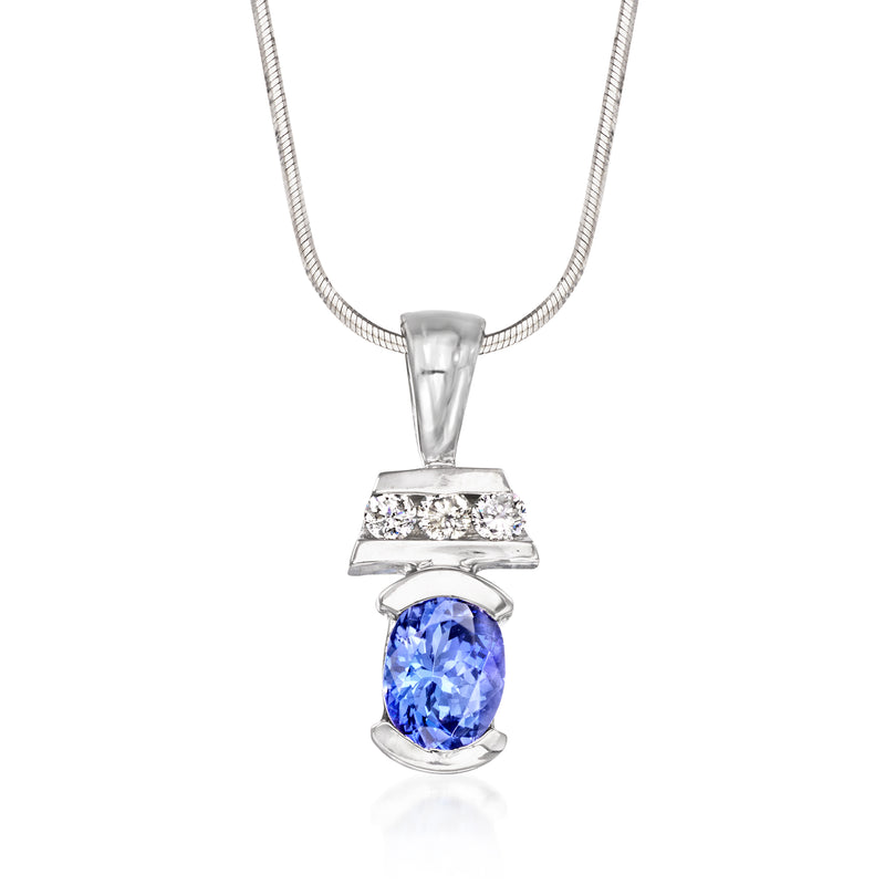 Oval blue tanzanite pendant with diamond accents on 14kt white gold chain