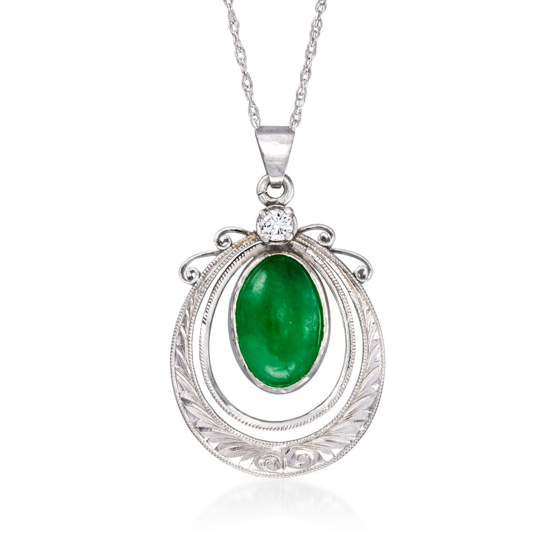 Vintage jade oval pendant necklace with single diamond in platinum setting