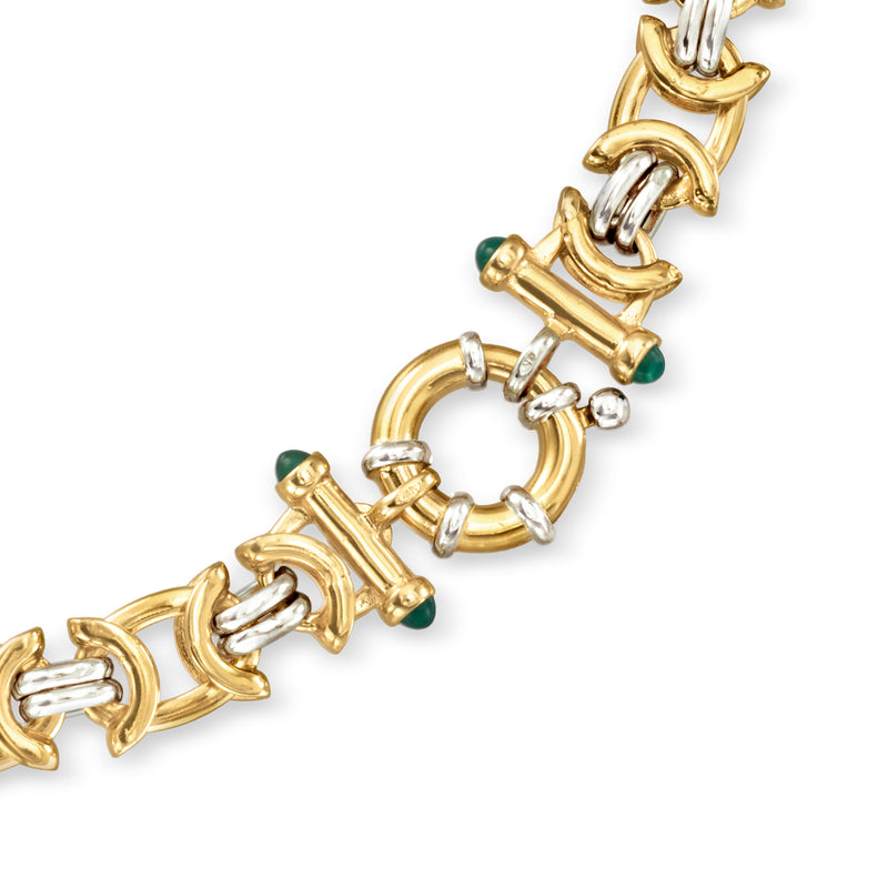 Two-tone gold fancy-link necklace close-up with green chalcedony accents