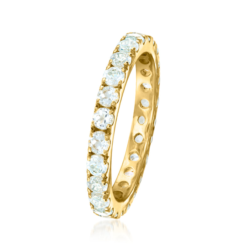 Slim 18kt gold over sterling eternity ring with light blue topaz stones all around