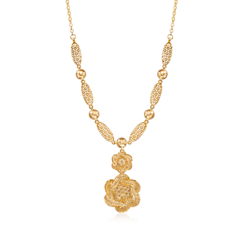Vintage yellow gold flower drop necklace with textured ovals and blossom pendant