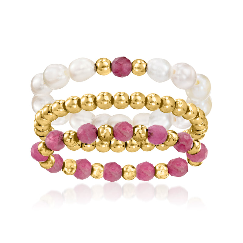 Three stretch rings with white cultured pearls, pink tourmaline beads, 10kt yellow gold