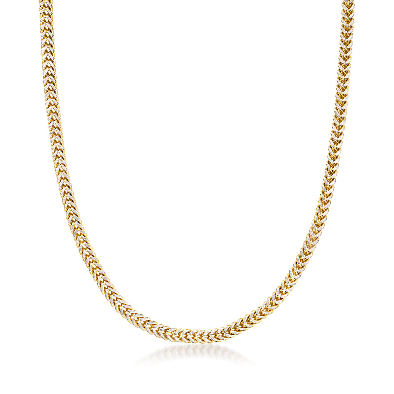 Two-tone gold fancy-link chain necklace, long and curved close-up