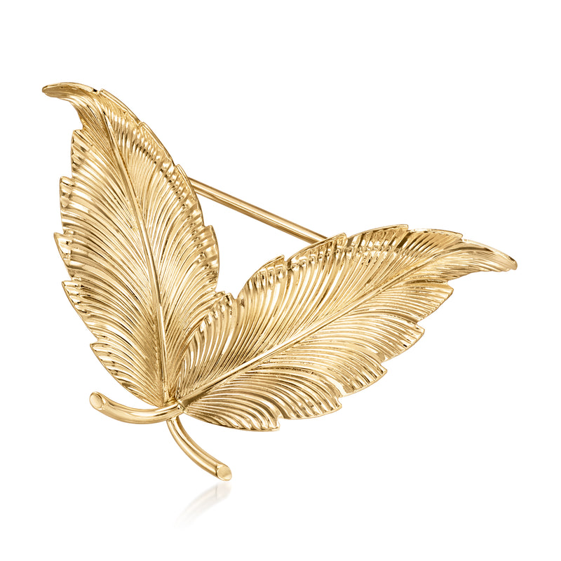 Gold double feather lapel pin with textured ridged feathers and clasp back