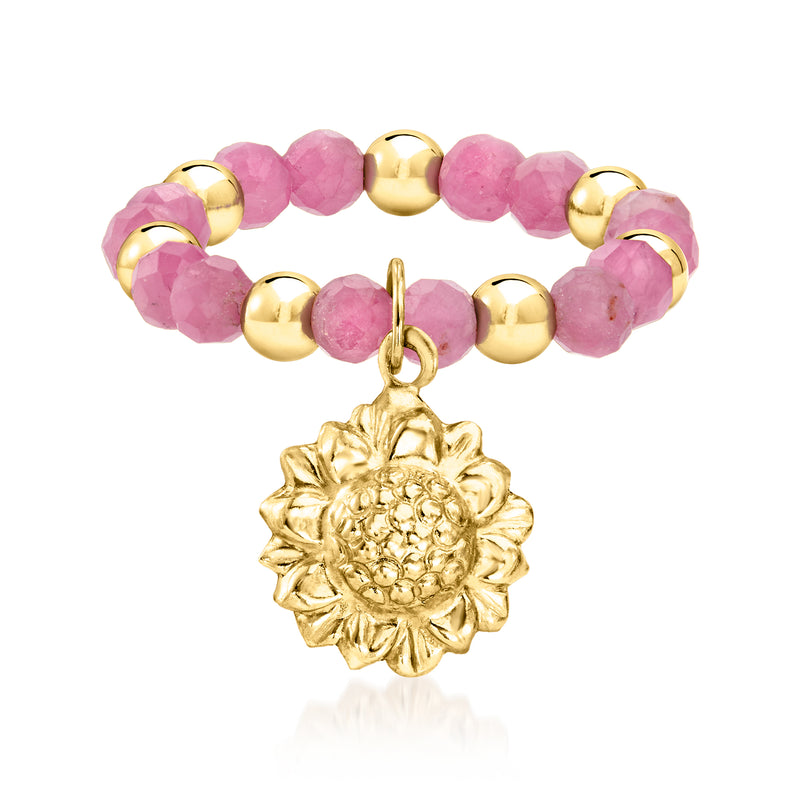 Pink tourmaline bead stretch ring with 10kt yellow gold sunflower charm