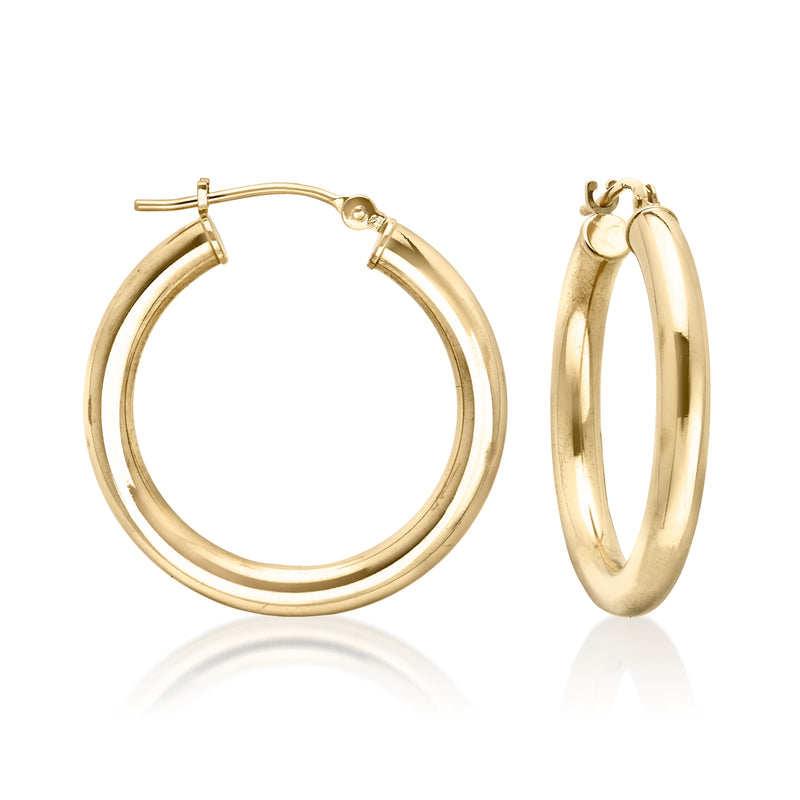 Gold hoop earrings with latch backs and partial heart dangles