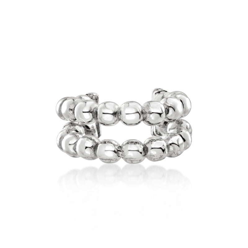 Two sterling silver ear cuffs with linked bead detail, stacked open hoops