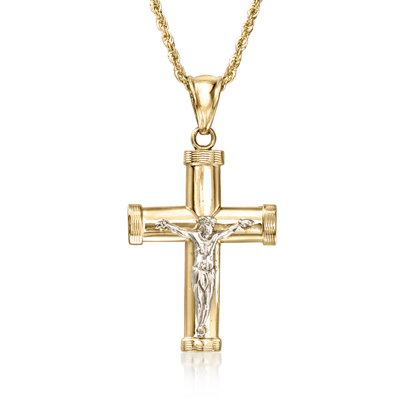 Two-tone gold crucifix pendant with center figure on gold chain, detailed cross