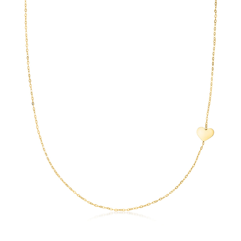 10kt yellow gold heart station necklace with delicate chain and single heart charm