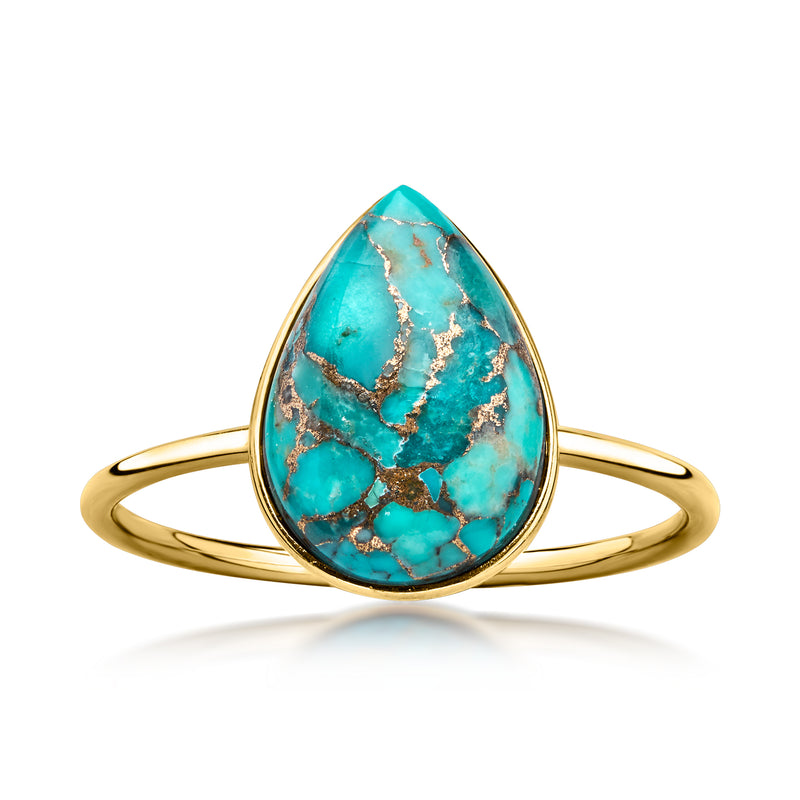10kt yellow gold ring with oval turquoise cabochon in raised bezel