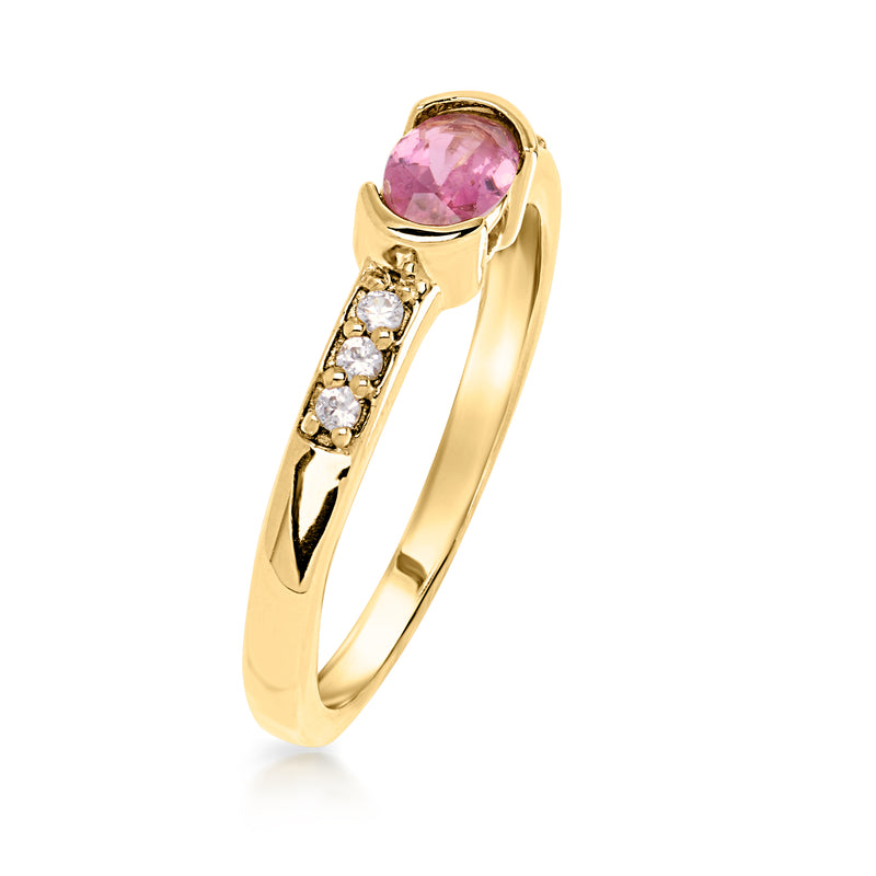 Side view gold ring with raised bezel oval pink gemstone and white stone row