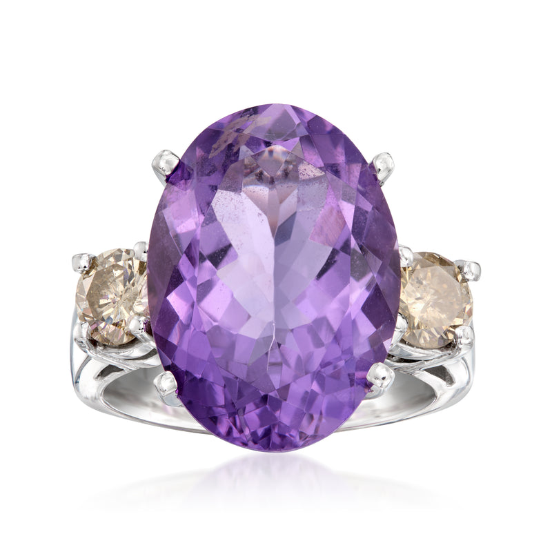 Amethyst and diamond oval ring in 14kt white gold, purple stone with side diamond accents