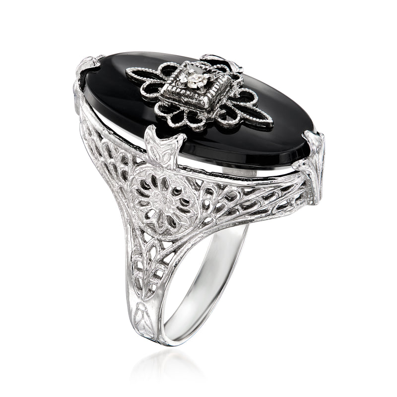 White gold onyx cabochon ring, side view with wide filigree band and diamond-accented top
