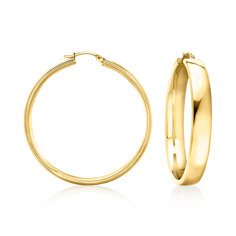 Gold-plated hoop earrings, smooth round profile with hinged clasp, polished finish