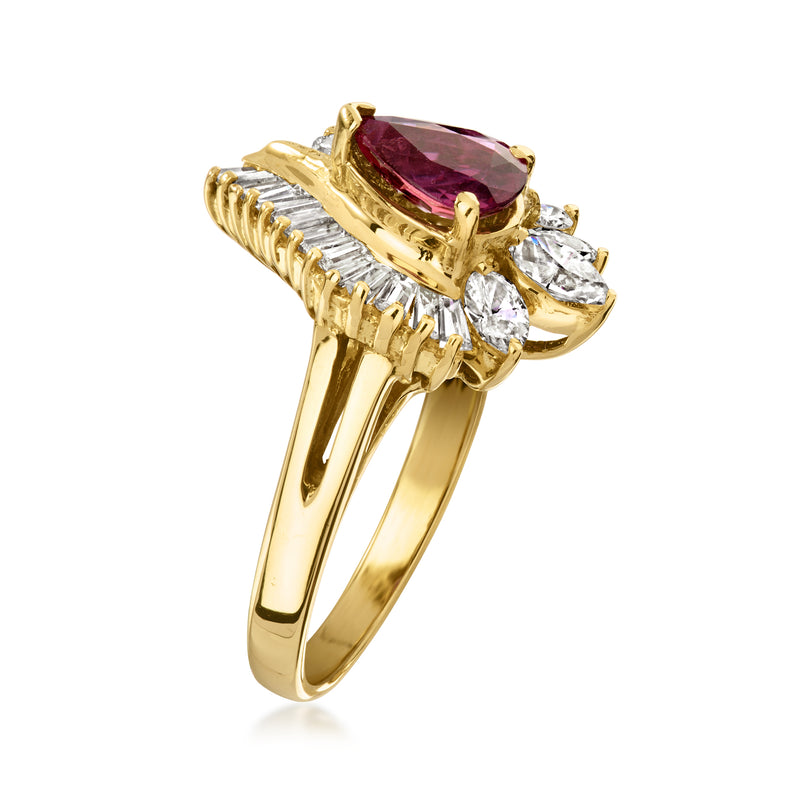 Pear-shaped ruby centerpiece ring with baguette diamonds, prong-set in yellow gold