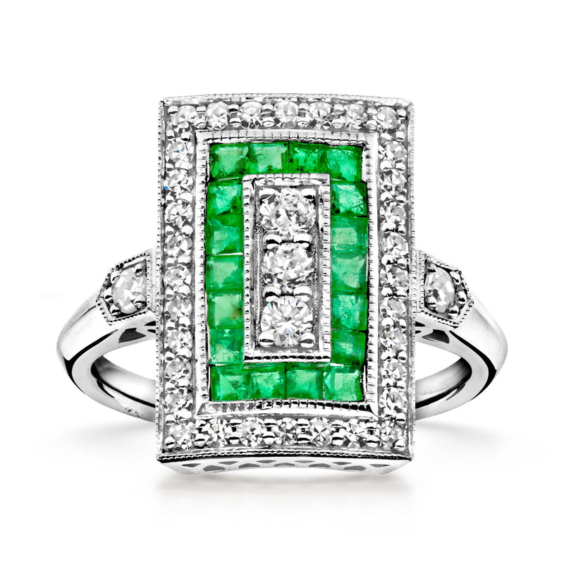 Platinum vintage ring with emerald center and diamond halo, square-cut bezel