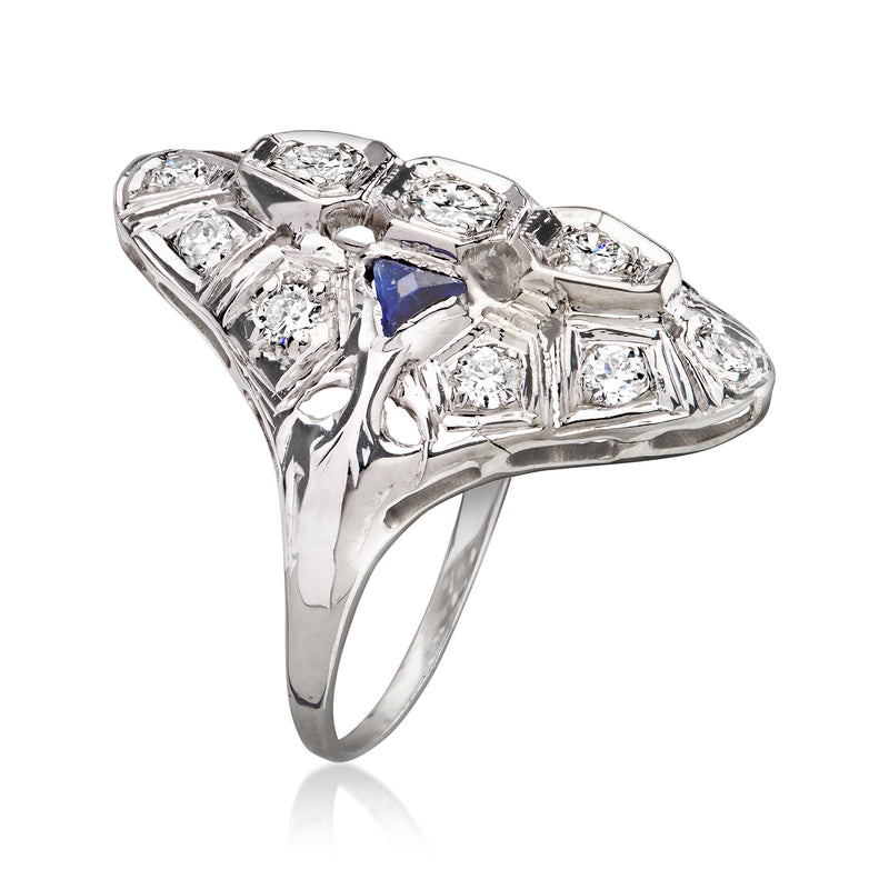 White gold statement ring with multi-stone geometric setting and two blue center accents