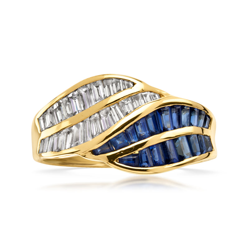 18kt yellow gold wave ring with blue sapphire and baguette diamond accents
