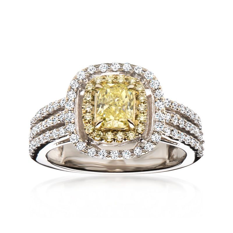 Two-tone gold vintage ring with yellow cushion diamond center and white diamond halo