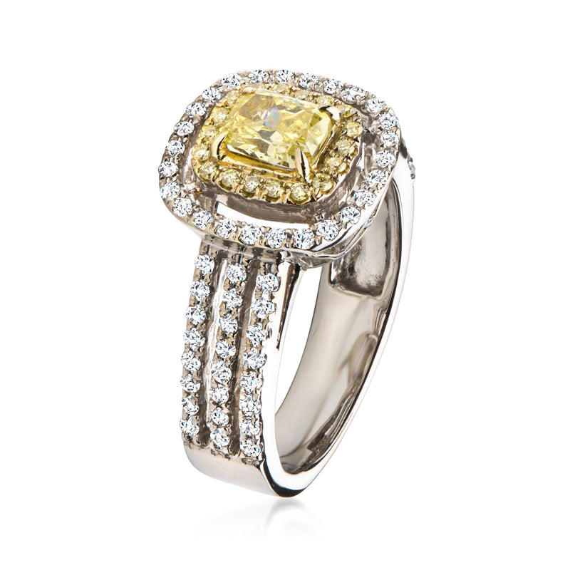 Two-tone gold diamond ring with yellow cushion center, surrounded by white pave accents