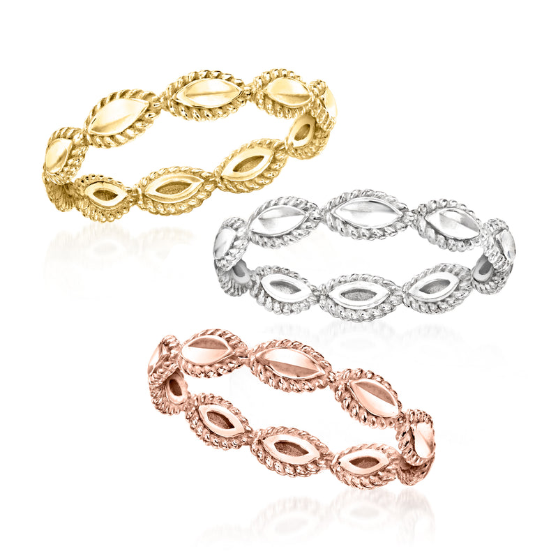 Three stackable rings set: gold, silver, and rose-tone with oval links and texture