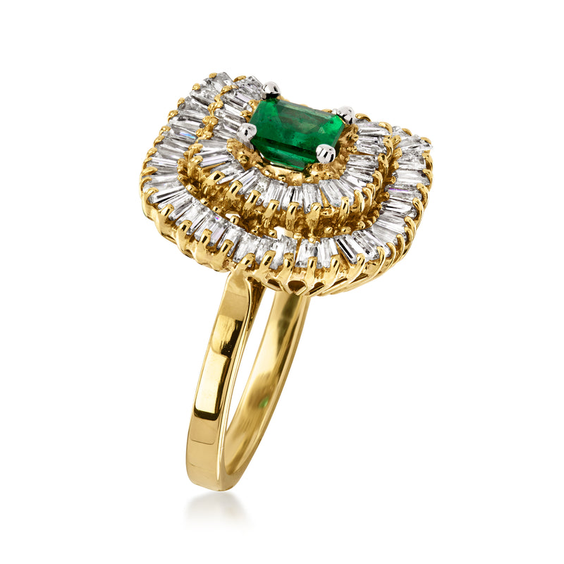14k yellow gold ring with green emerald set in diamond baguette halo, side view